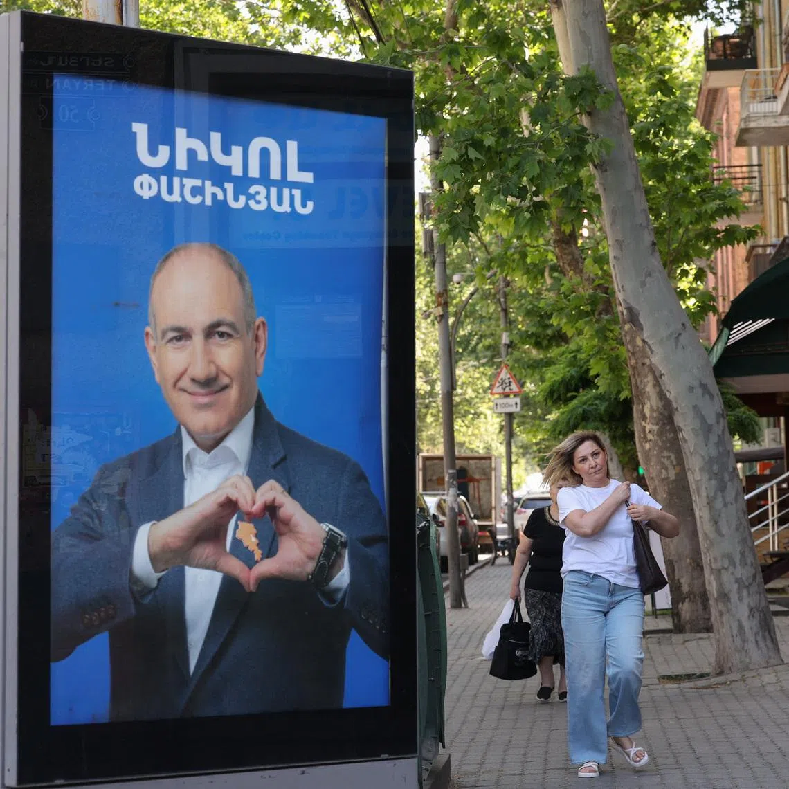 Campaign banners with portraits of Armenian Prime Minister Nikol Pashinyan of the Civil Contract party in Yerevan, Armenia, on June 3.