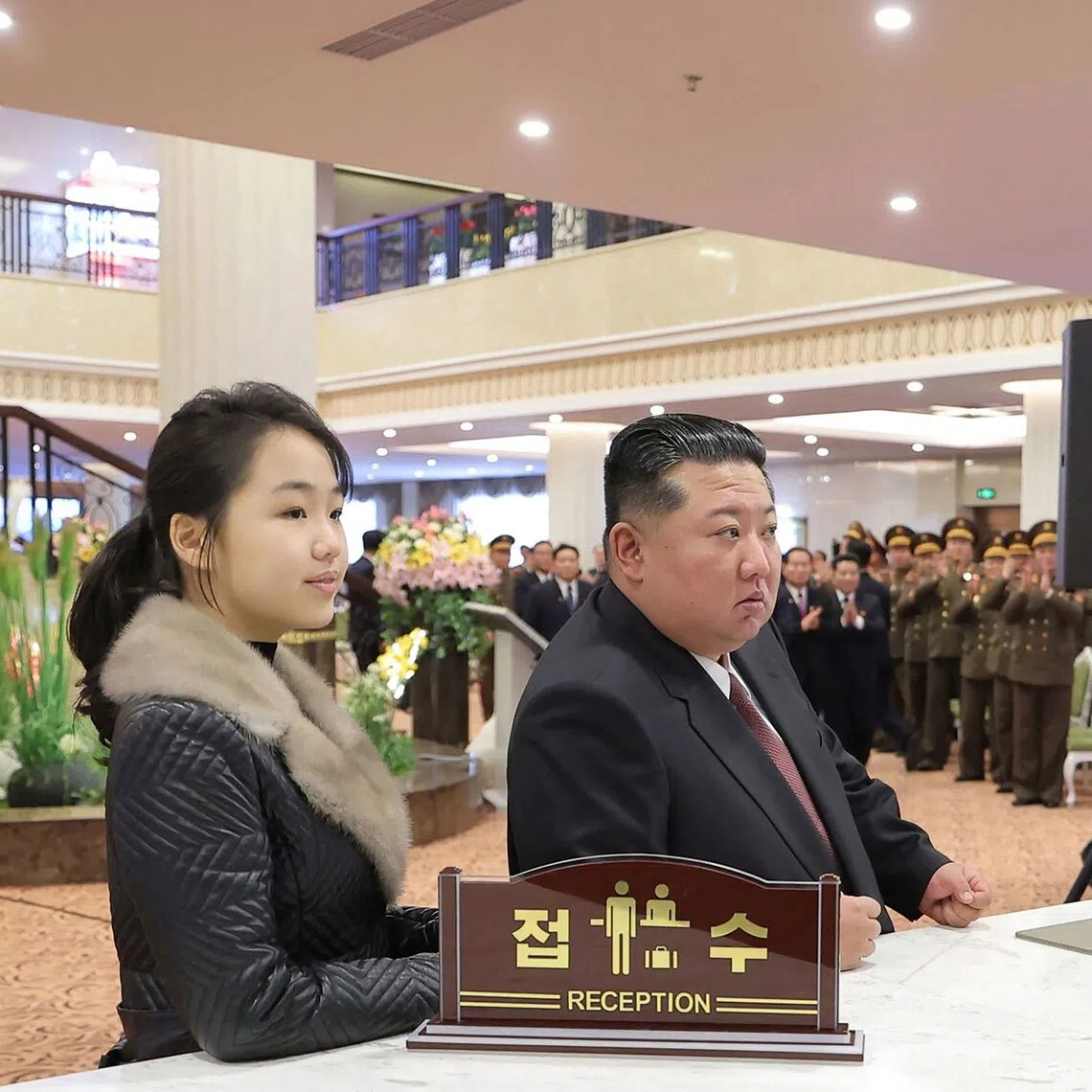 North Korean leader Kim Jong Un (right) and his daughter Ju Ae inspecting the Milyong Hotel.
