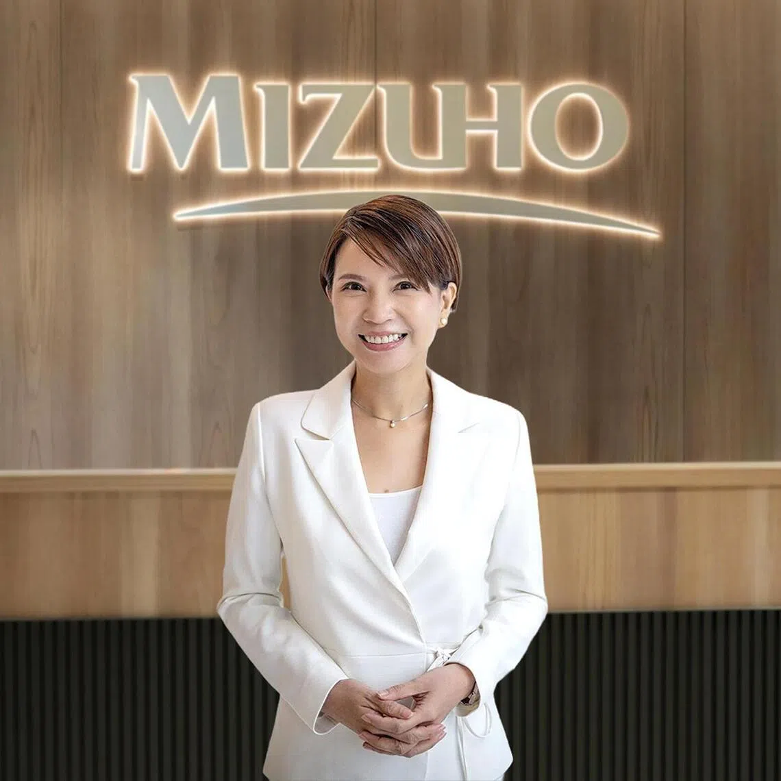 Singaporean workers can combine speed, agility and execution often associated with the West with Asian values of respect, trust and consensus-building, says Mizuho Singapore’s chief executive Josephine Lok.