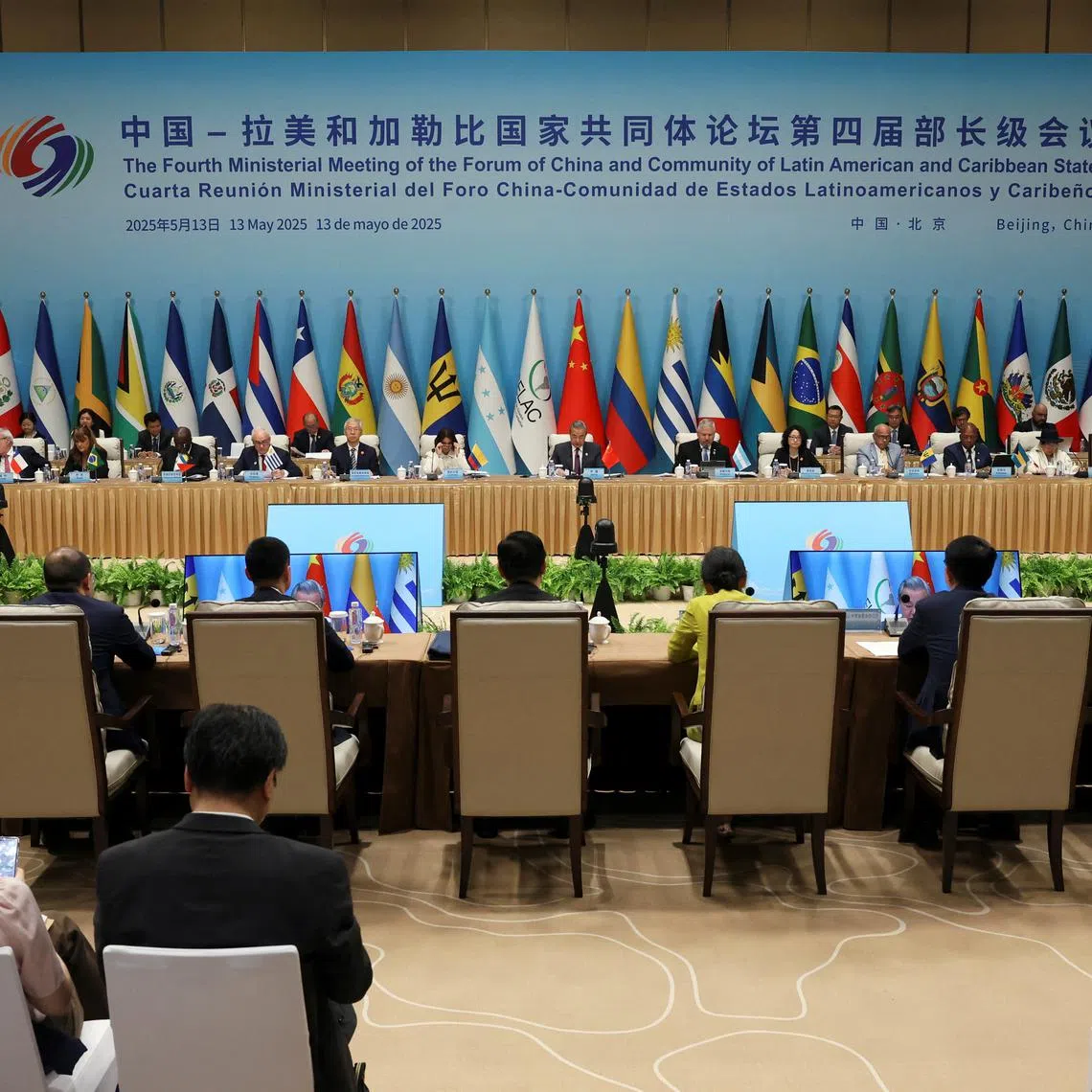 Chinese Foreign Minister Wang Yi speaks at the plenary session of the China-CELAC Forum ministerial meeting in Beijing, China May 13, 2025. REUTERS/Florence Lo/Pool