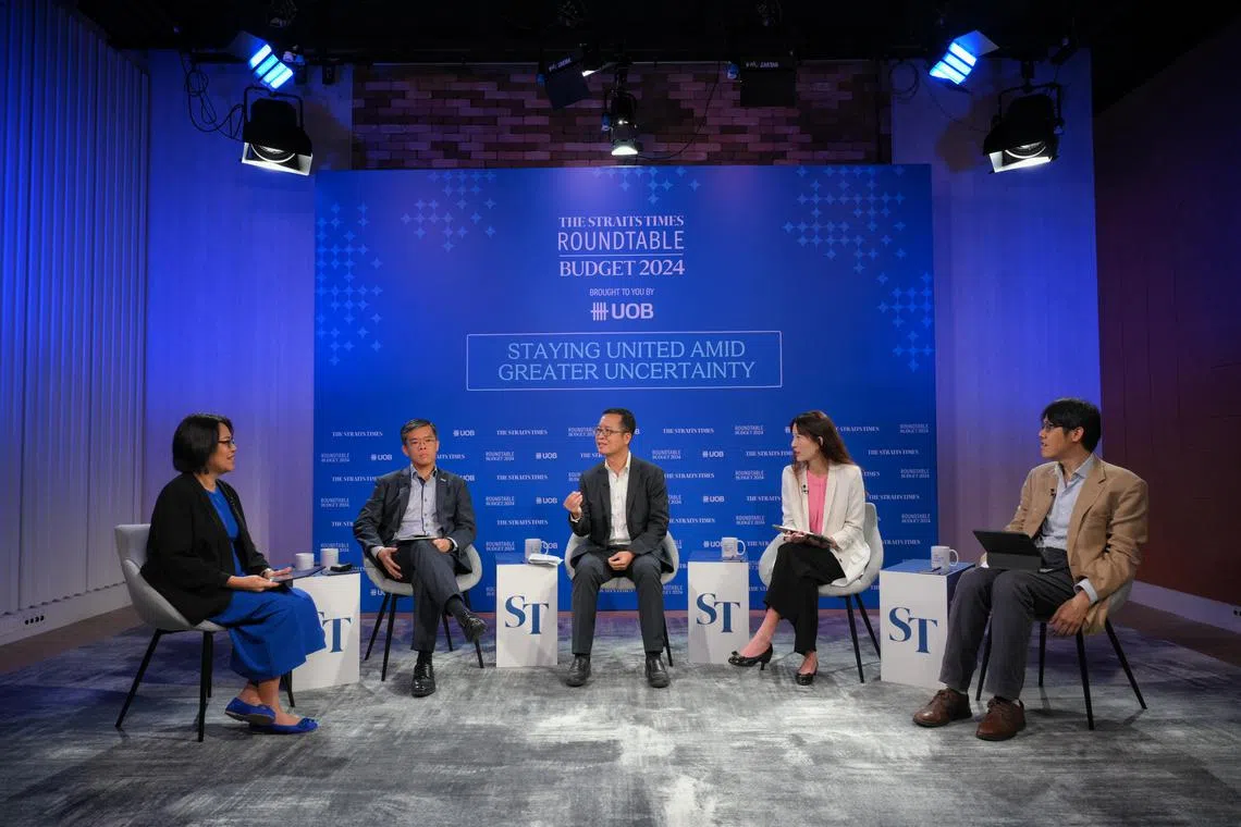From left, Lee Su Shyan, ST-UOB post budget roundtable moderator and The Straits Times Associate Editor and Senior Columnist, Kok Ping Soon, CEO of the Singapore Business Federation, Alvin Liew, Senior Economist and Senior Vice President of Global Economics and Markets Research at United Overseas Bank (UOB), Irene Tai, Energy, Utilities and Resources Tax Leader, and Associate Professor Walter Theseira, Associate Professor of Economics at Singapore University of Social Sciences' School of Business, pictured ahead of the ST-UOB post budget roundtable held on Feb 19, 2024.