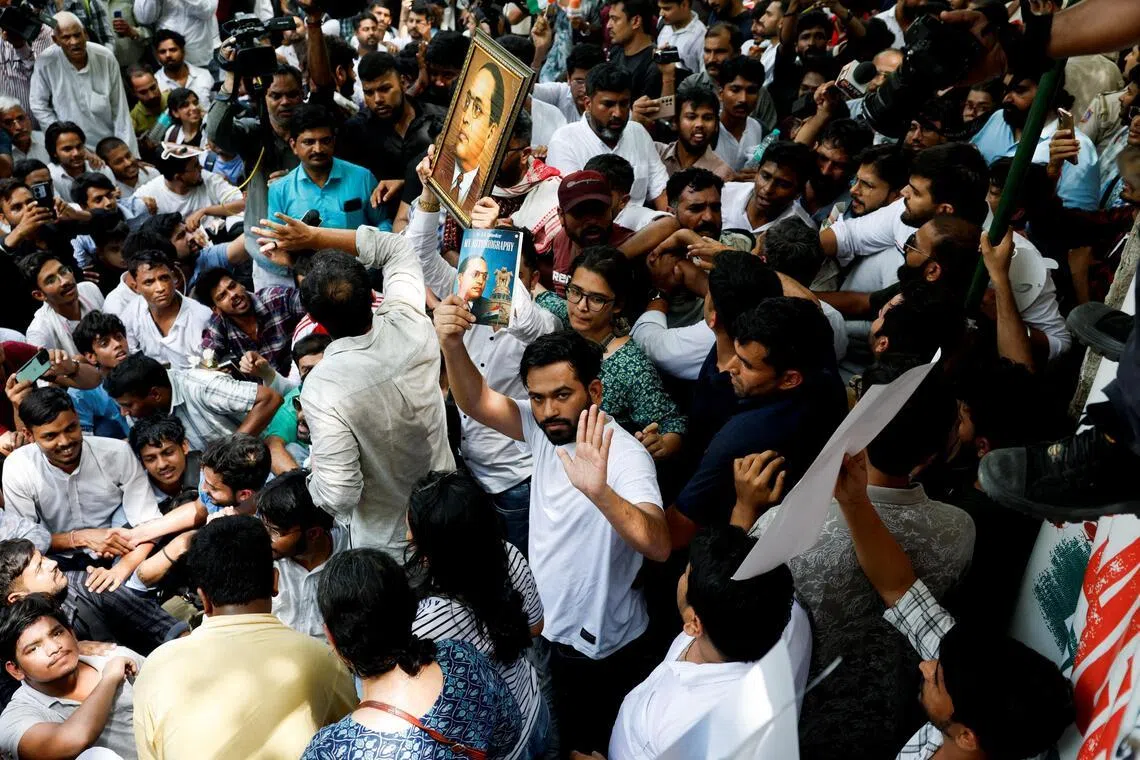 Cockroach Janta Party founder Abhijeet Dipke at a protest in New Delhi on June 6 demanding the resignation of Indian Education Minister Dharmendra Pradhan.