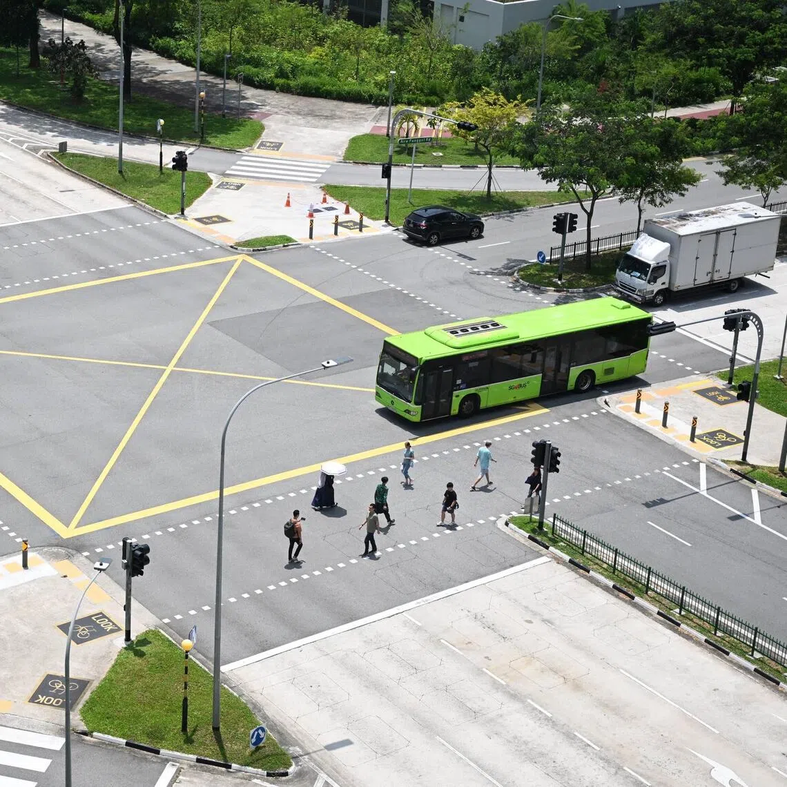 Sensors are planned for traffic lights at pedestrian crossings at the junction of Punggol Way and New Punggol Road as the robots may not have arms to press the push buttons.