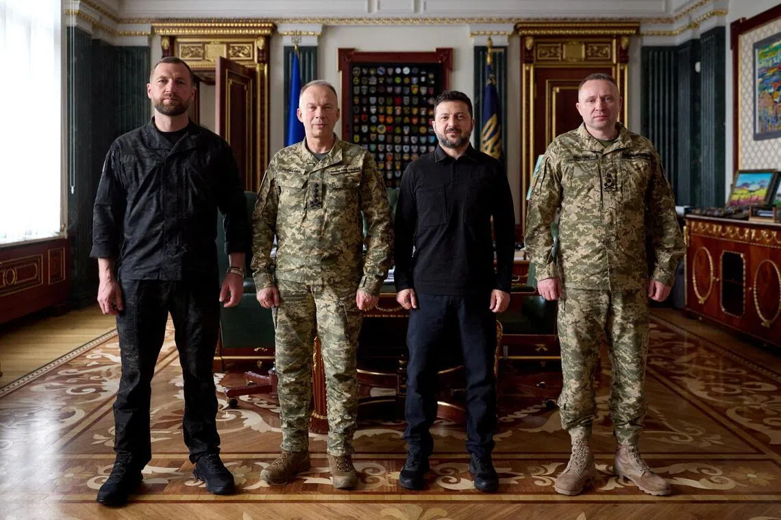 Ukrainian President Volodymyr Zelensky (second from left), with (from left) new army chief Mykhailo Drapatyi, his predecessor Oleksandr Syrskyi, and Acting Defence Minister Yevhenii Khmara.
