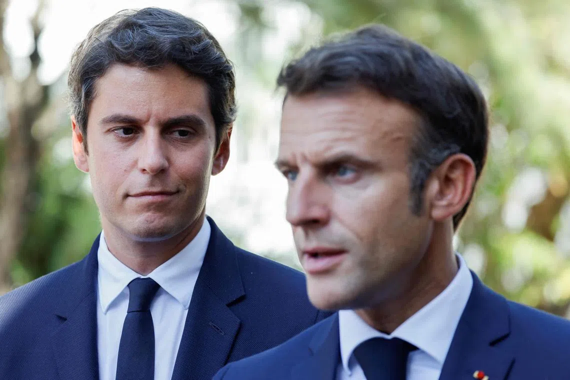 Mr Macron (right) and his new Prime Minister Gabriel Attal (left) worked to pull together a Cabinet.
