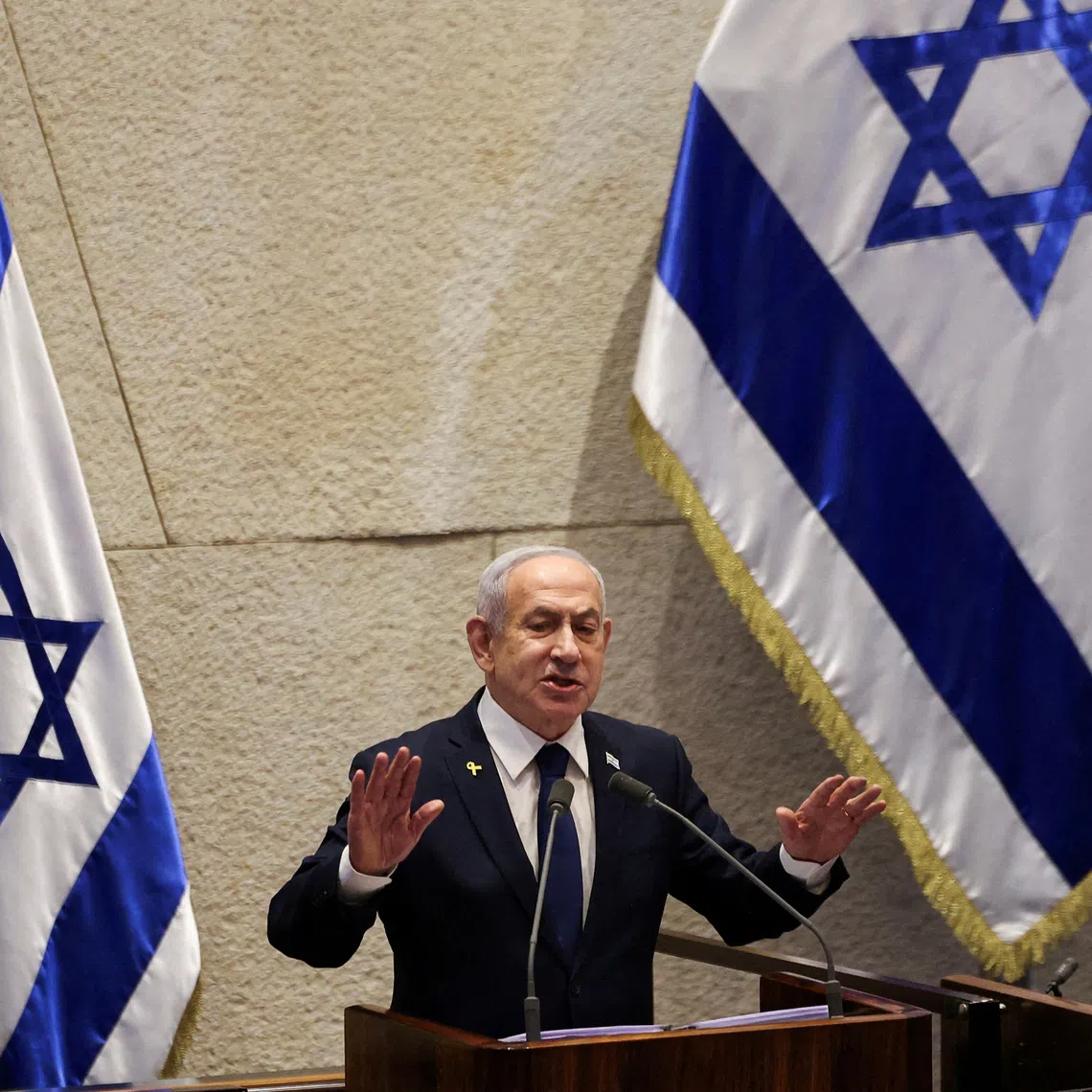 FILE PHOTO: Israeli Prime Minister Benjamin Netanyahu speaks at the plenum of the Knesset, Israel's parliament, in Jerusalem, November 10, 2025. REUTERS/Ronen Zvulun/File Photo