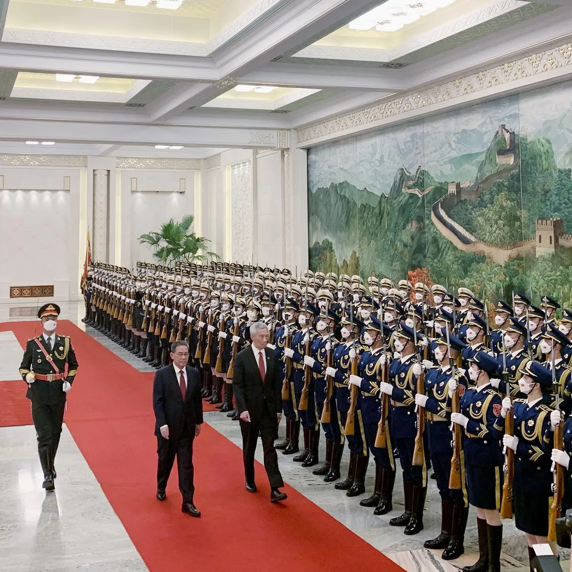 Prime Minister Lee Hsien Loong inspecting a guard of honour, accompanied by Chinese Premier Li Qiang, in the Great Hall of the People in the west of Beijing’s Tiananmen Square on April 1.