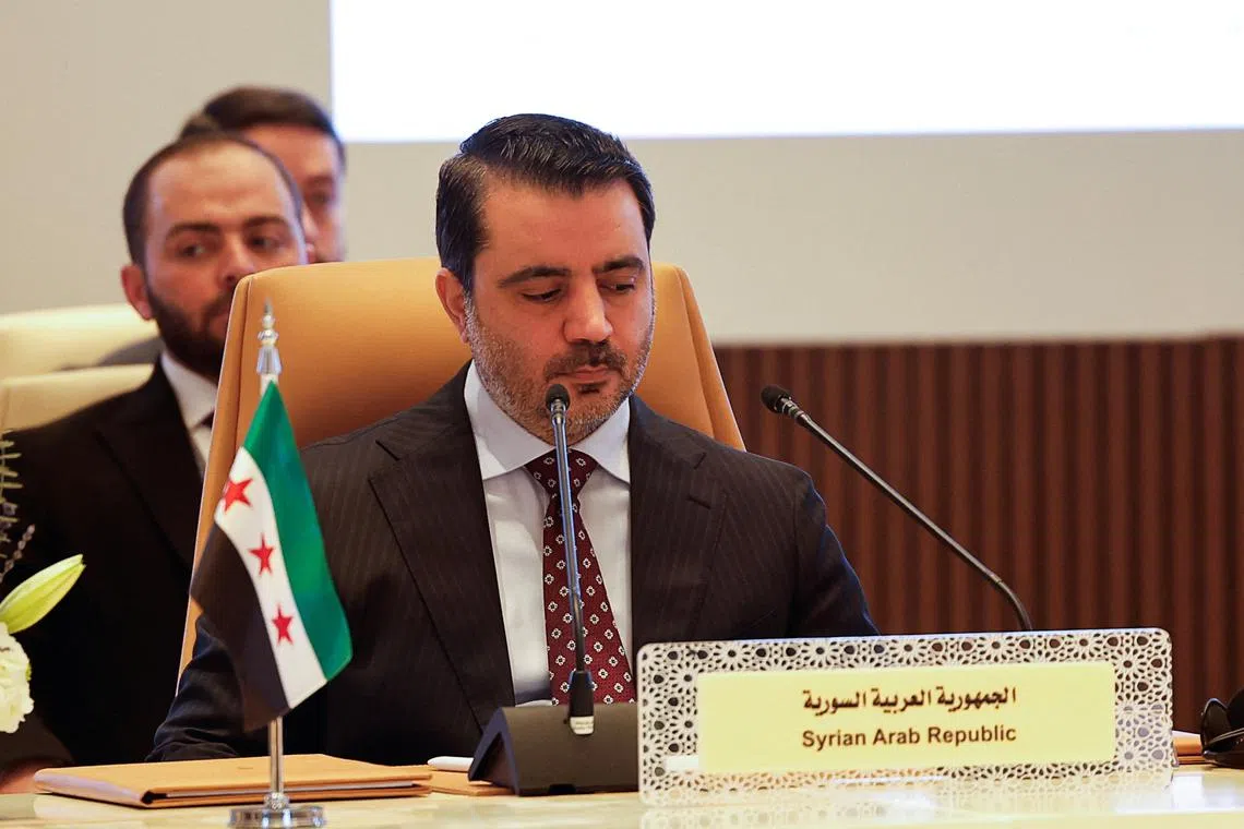 FILE PHOTO: Syria's Foreign Minister Asaad Hassan al-Shibani attends a meeting on Syria, following the recent ousting of president Bashar al-Assad, in Riyadh, Saudi Arabia, January 12, 2025. REUTERS/Hamad I Mohammed/File Photo
