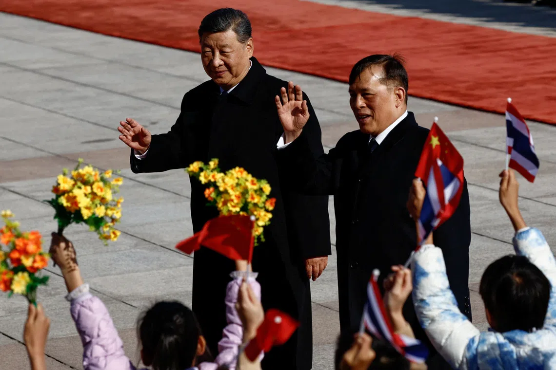 Thailand's King Maha Vajiralongkorn and Chinese President Xi Jinping attend a welcoming ceremony at the Great Hall of the People, in Beijing, China November 14, 2025. REUTERS/Tingshu Wang/Pool