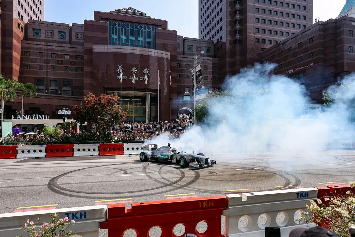 Mercedes reserve driver Fred Vesti doing a “doughnut” during adidas’ Orchard Ignition event on Aug 30.