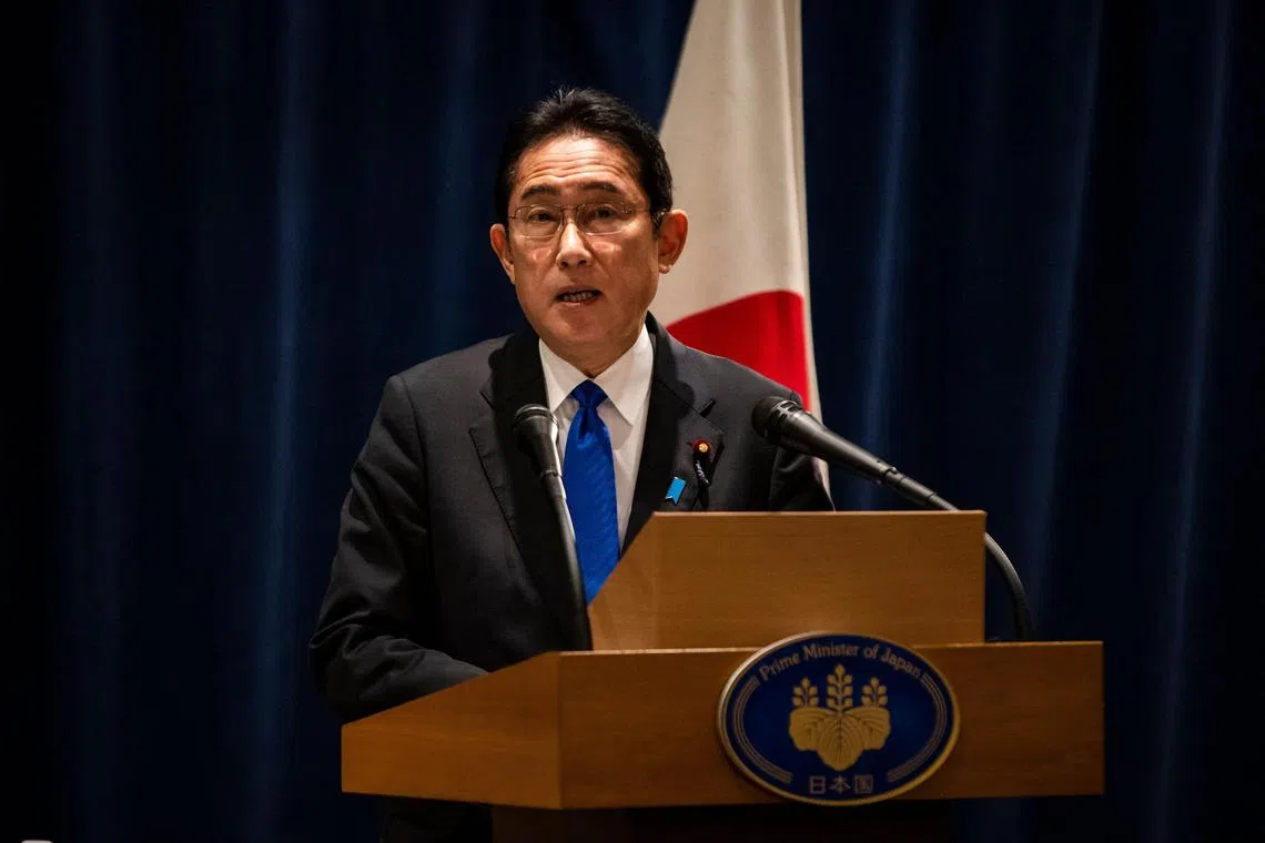 Japanese Prime Minister Fumio Kishida speaks during a press conference at the Willard Hotel in Washington, DC, on January 14, 2023. - On Saturday, former Russian President Dmitry Medvedev called for Prime Minister Kishida to commit “seppuku”, a ritualistic suicide by disembowelment, after he joined US President Biden in warning Putin against using nuclear weapons in Ukraine. (Photo by SAMUEL CORUM / AFP)
