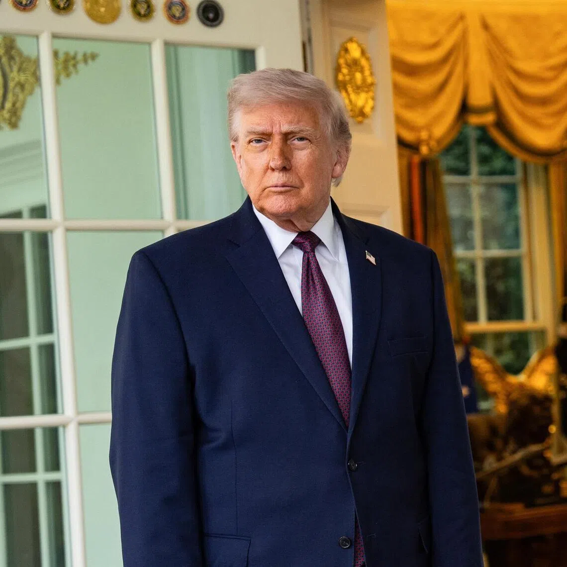 US President Donald Trump speaking to members of the media outside the Oval Office on April 13, 2026.  