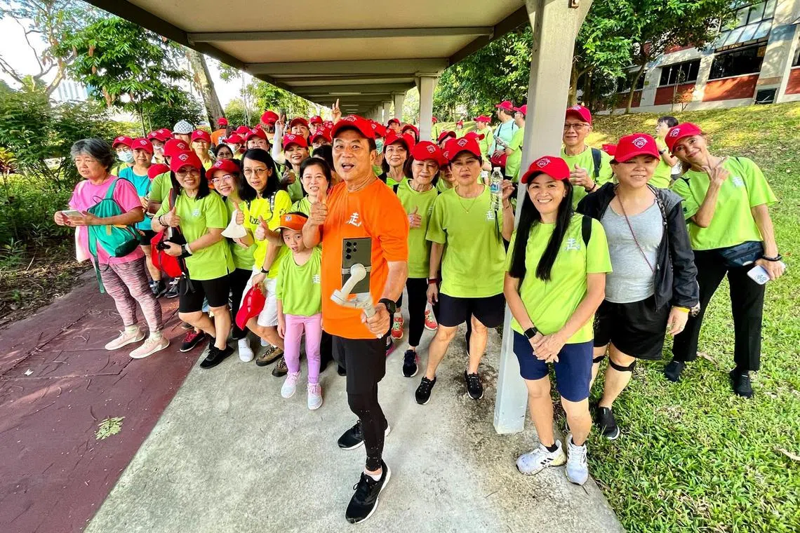 baperfect01 - Singaporean film-maker Jack Neo (centre) with some of the participants in his Lao Peng You Pa Pa Zao initiative.

Conditions of use: SPH use
Copyright: Jack Neo