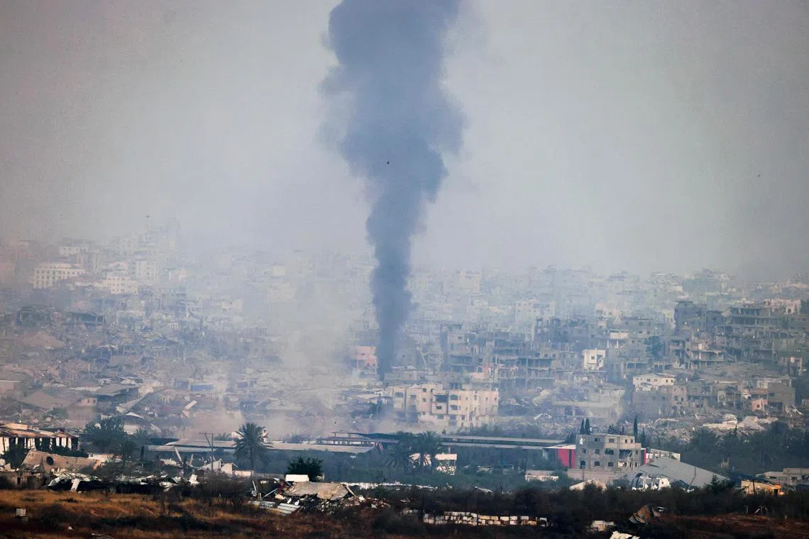 Smoke billowing due to Israeli bombardment in the besieged Palestinian territory on May 18.