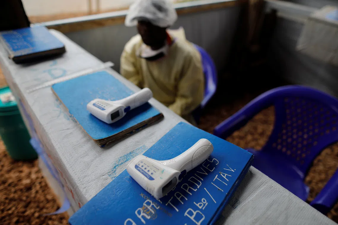 FILE PHOTO: Thermometers are pictured at the entrance of an Ebola Treatment Centre in the Democratic Republic of Congo, October 4, 2019. REUTERS/Zohra Bensemra/ File Photo