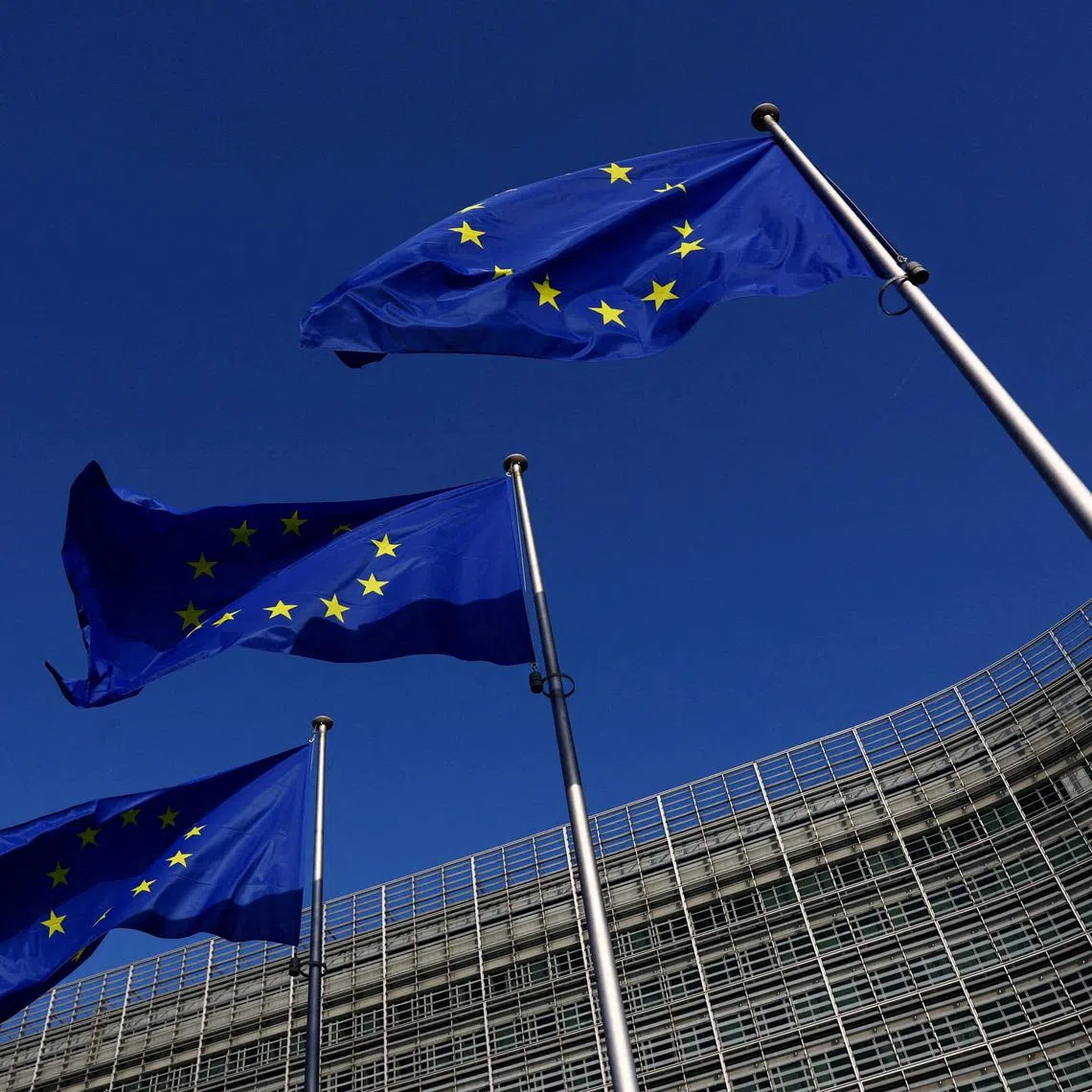 FILE PHOTO: European Union flags flutter outside the European Commission headquarters in Brussels, Belgium Februrary 26, 2026. REUTERS/Yves Herman/File Photo