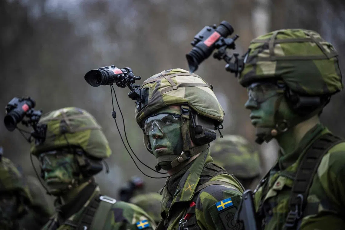 Swedish soldiers take part in a military exercise near Stockholm.
