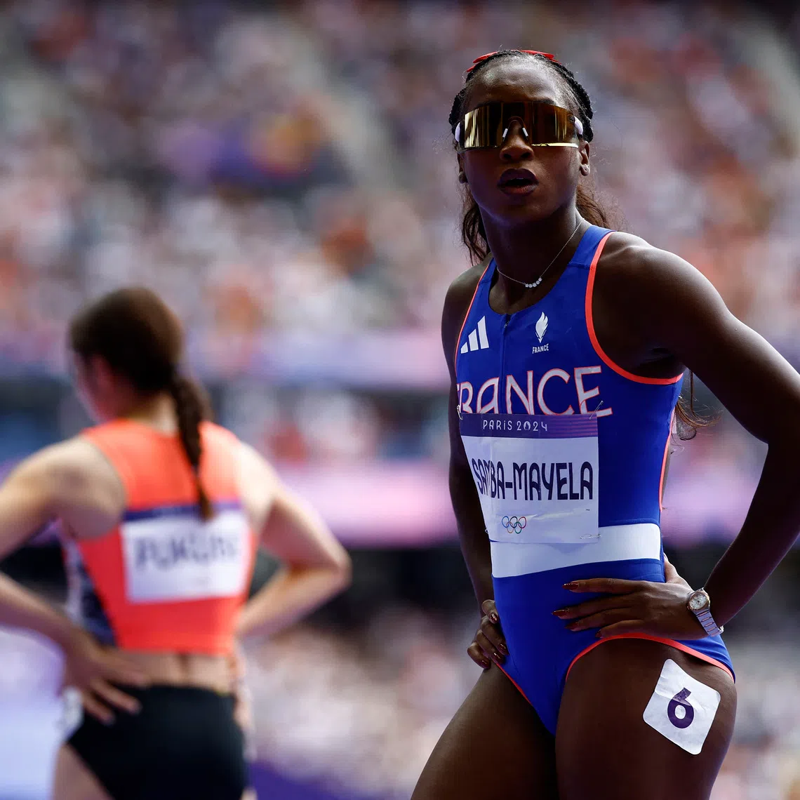 FILE PHOTO: Paris 2024 Olympics - Athletics - Women's 100m Hurdles Semi-Final - Stade de France, Saint-Denis, France - August 09, 2024. Cyrena Samba-Mayela of France reacts after competing in semi final 3. REUTERS/Sarah Meyssonnier/File Photo