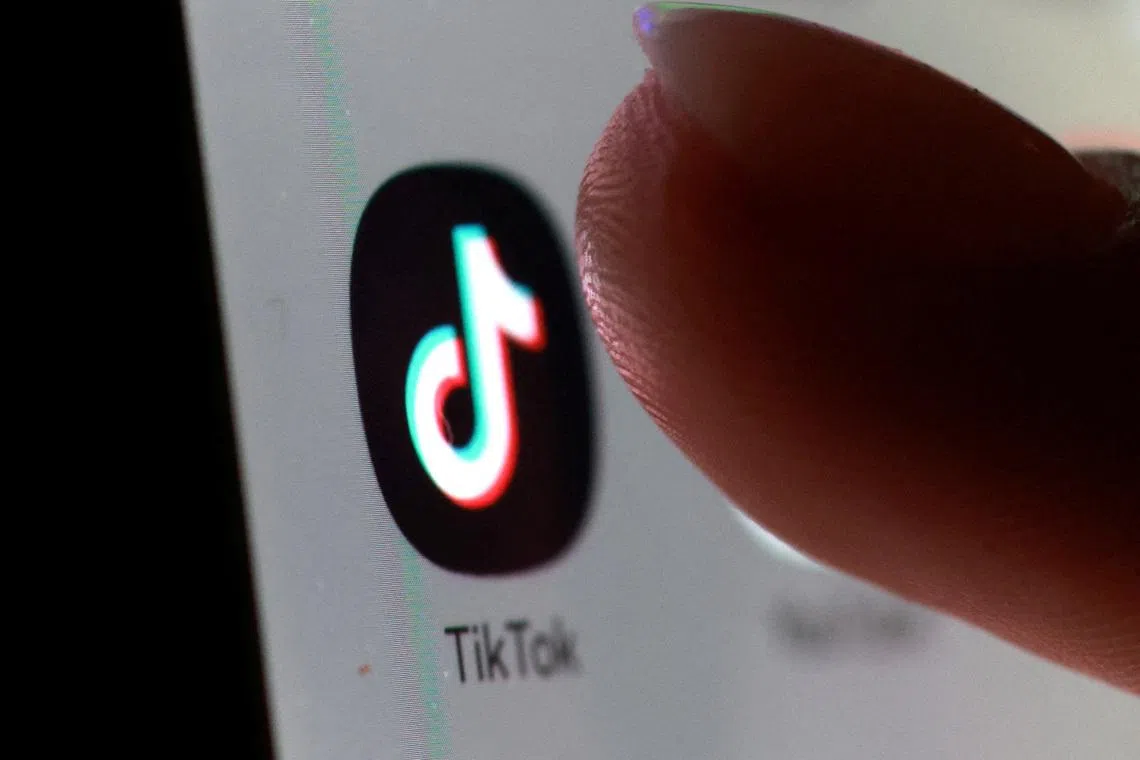 FILE PHOTO: The TikTok app icon on a smartphone in this illustration taken October 27, 2025. REUTERS/Dado Ruvic/Illustration/File Photo