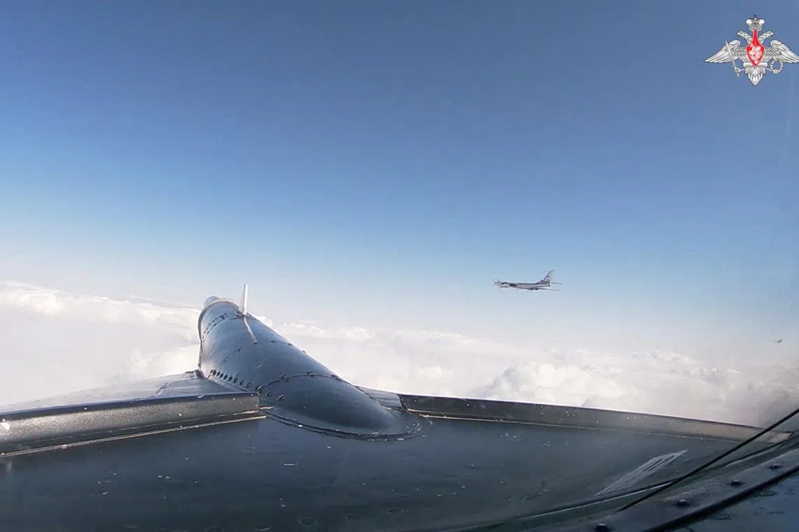 The Russian ministry released a video on Jan 30 of two Tupolev-95 aircraft conducting what it called a regular flight.