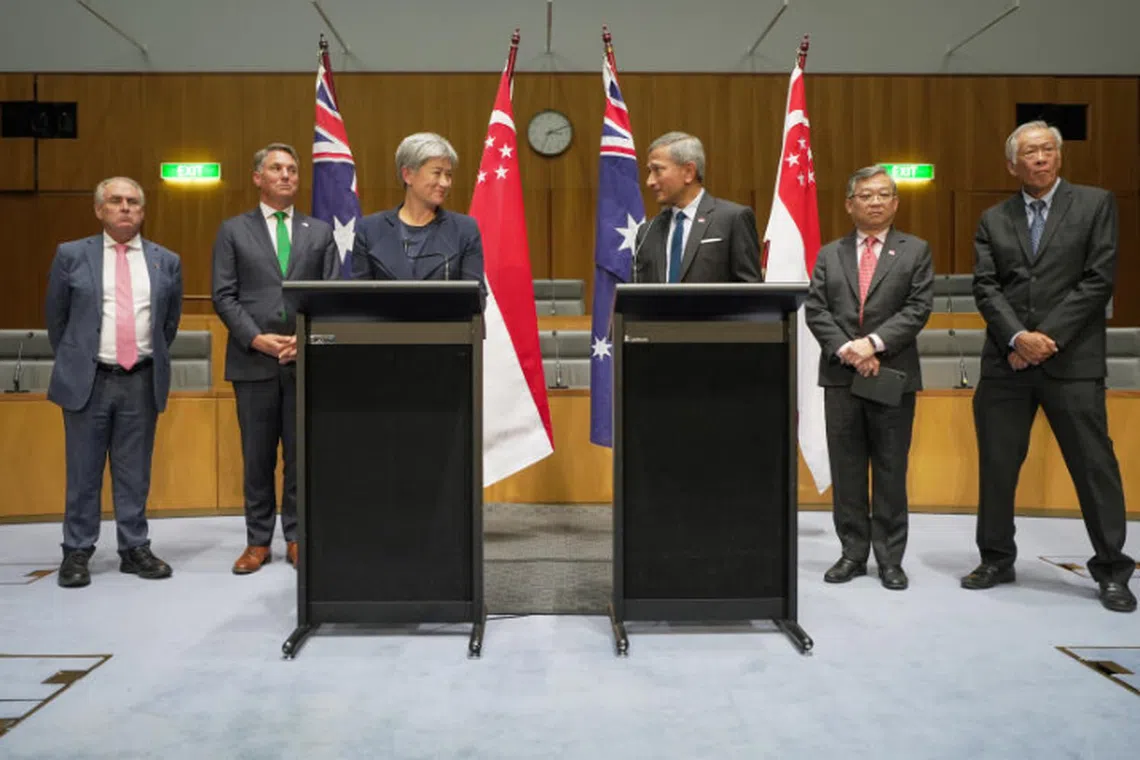 Minister for Foreign Affairs Dr Vivian Balakrishnan (third from right), Minister for Trade and Industry Mr Gan Kim Yong (second from right) and Minister for Defence Dr Ng Eng Hen (right) participated in the Singapore-Australia Joint Ministerial Committee in Canberra on May 1, 2023. Australia was represented Minister for Foreign Affairs Penny Wong (thirs from left), Deputy PM and Minister for Defence Richard Marles (second from left) and Minister for Trade and Tourism and Special Minister of State Don Farrell (left).

