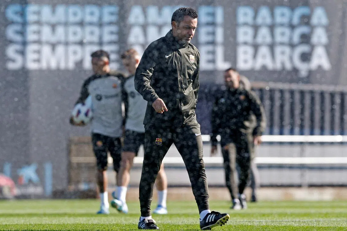 FILE PHOTO: Soccer Football - LaLiga - FC Barcelona Training - Ciutat Esportiva Joan Gamper, Barcelona, Spain - November 3, 2023 Barcelona coach Xavi Hernandez during training REUTERS/Albert Gea/File Photo