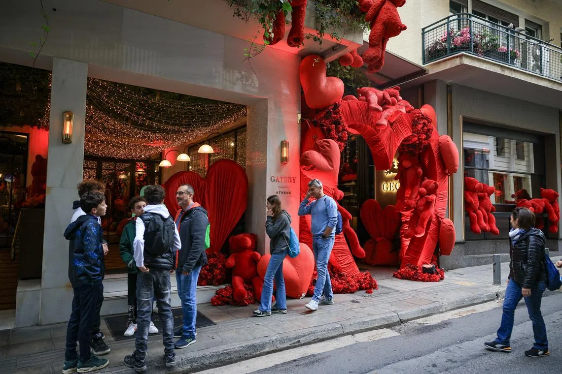 People walk next to a hotel, where Israeli producer and creator of TV show \"Tehran\" Dana Eden was found dead, in Athens, Greece, February 16, 2026. REUTERS/Louisa Gouliamaki