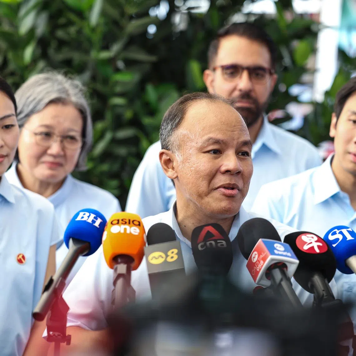 Workers' Party candidate Faisal Manap speaks to the media during a doorstop in Tampines on April 28.