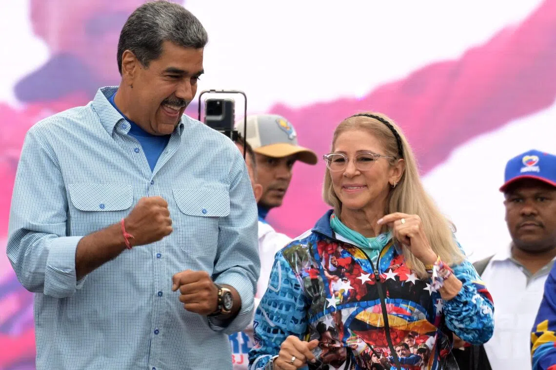 Ousted Venezuelan President Nicolas Maduro (left) and his wife, Cilia Flores, seen here in a 2024 photo, are scheduled to go on trial starting June 1, 2027.