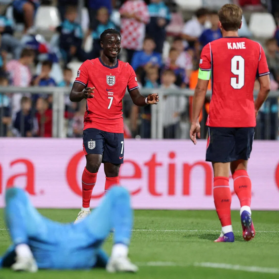England’s Bukayo Saka celebrates scoring their sixth goal against Croatia with Harry Kane.