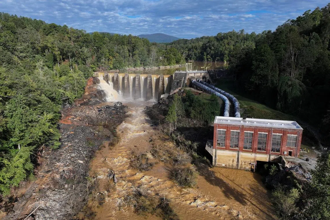A drone view shows Turner Shoals Dam, following the passing of Hurricane Helene, in Mill Spring, North Carolina, U.S., September 30, 2024. REUTERS/Marco Bello REFILE - REMOVES "ON U.S. ROUTE 64".