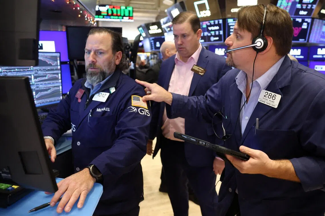 Traders working on the floor of the New York Stock Exchange, in New York City, on Jan 6.