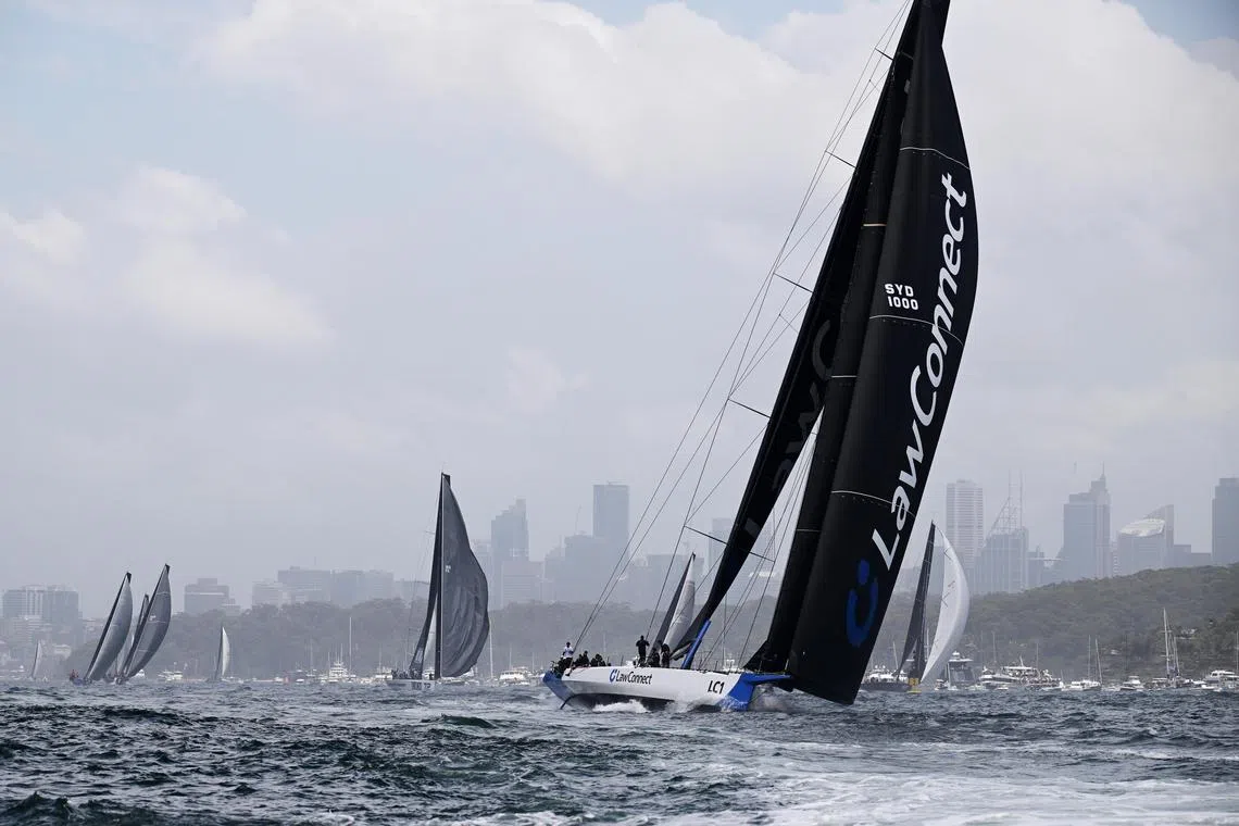 LawConnect leads the fleet at the start of the Sydney Hobart Yacht Race 2023 in Sydney.