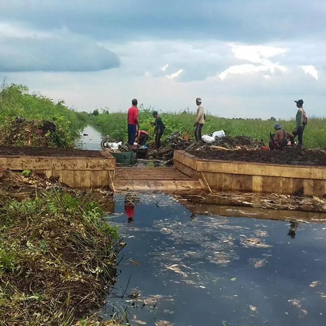 Fighting fires is only a downstream response to the haze crisis. The real solution lies upstream, in better management of peatlands to prevent fires from starting, says the writer.