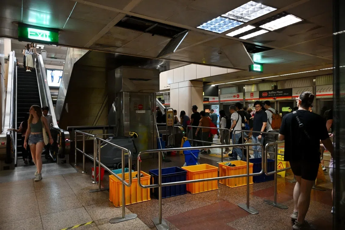 A ceiling leak at Raffles Place MRT station’s North-South Line platform on Sept 17.