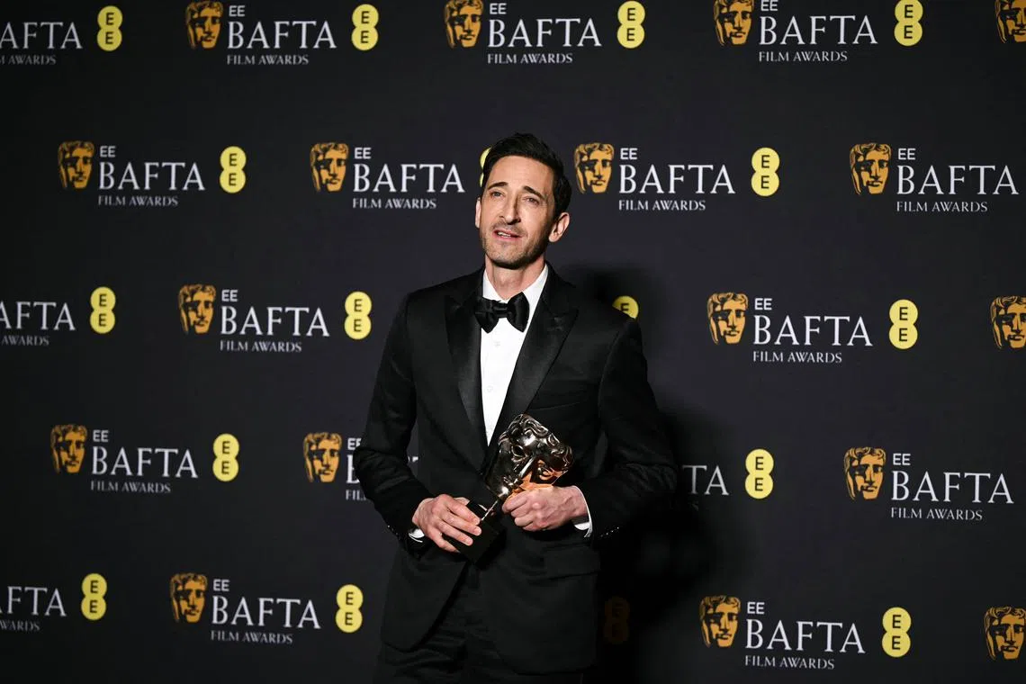 Actor Adrien Brody poses with the award for best leading actor for The Brutalist during the British Academy Film Awards ceremony at the Royal Festival Hall in London on Feb 16, 2025. 