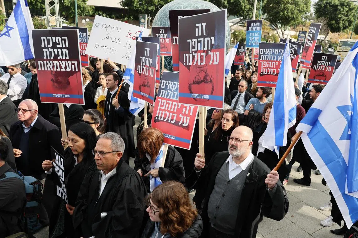 Lawyers protest against the government's controversial plans to overhaul the judicial system, in Tel Aviv, on Jan 12, 2023.
