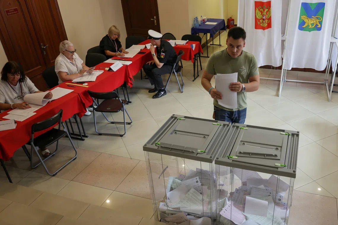 A voter at a polling station on the first day of Russia’s parliamentary elections in Vladivostok, Russia, on Sept 18.
