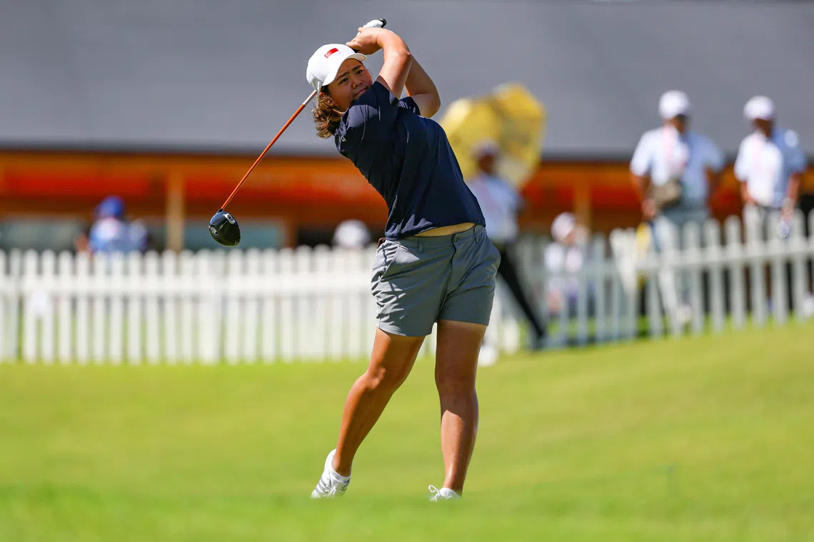 Shannon Tan maintained her place at the top of the leaderboard at the Asian Games after carding a six-under 64 in the second round on Oct 1.