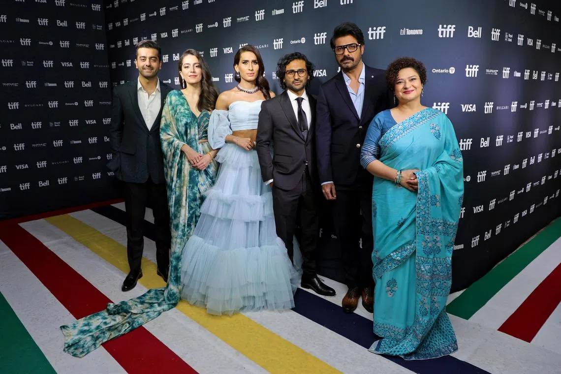 Director Saim Sadiq (left) with cast members from Joyland at the film's premiere at the the 2022 Toronto International Film Festival on Sept 12, 2022.