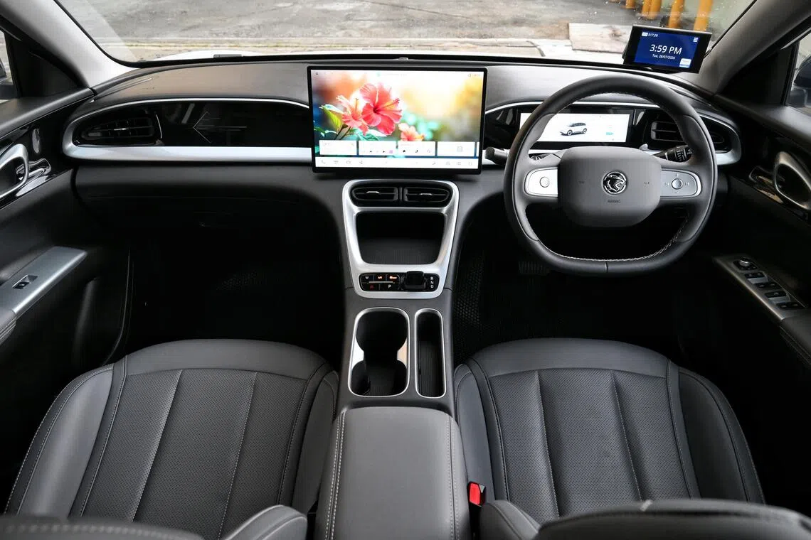 Function over form: The cockpit is unremarkable to look at, but serves the driver satisfactorily.