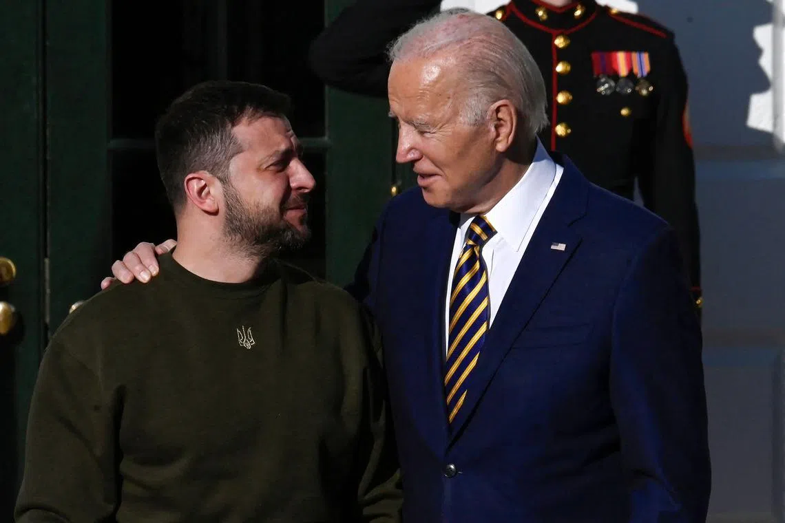 US President Joe Biden welcomes Ukraine's President Volodymyr Zelensky on the South Lawn of the White House on Dec 21, 2022.