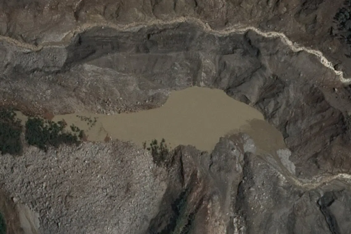 Nepal monitoring two lakes, flood risk to remain until they're fully drained, official says
