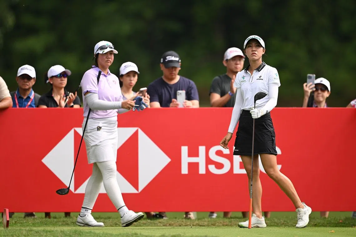 SINGAPORE, SINGAPORE - MARCH 01: Xingtong Chen of Singapore and Lydia Ko of New Zealand look across the 14th tee during Day Two of the HSBC Women's World Championship at Sentosa Golf Club on March 01, 2024 in Singapore. (Photo by Ross Kinnaird/Getty Images)