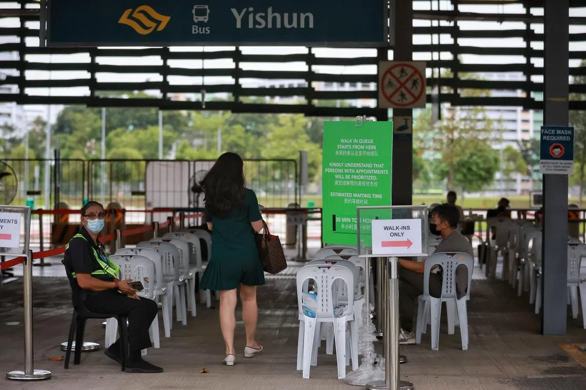 People walking in for Covid-19 vaccination at the Joint Testing and Vaccination Centre in Yishun (former Yishun Bus Interchange) on Jan 4, 2023. ST Photo: Kevin Lim alvax04

Today is the first day when anyone can walk in for Covid-19 jabs at vaccination centres.