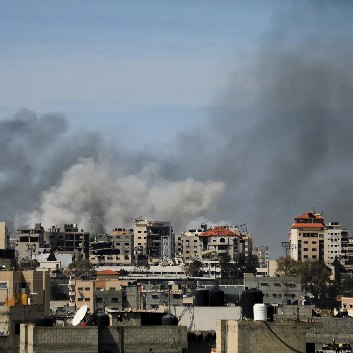 FILE PHOTO: Smoke rises during an Israeli raid at Al Shifa hospital and the area around it, amid the ongoing conflict between Israel and the Palestinian Islamist group Hamas, in Gaza City, March 21, 2024. REUTERS/Dawoud Abu Alkas/File Photo