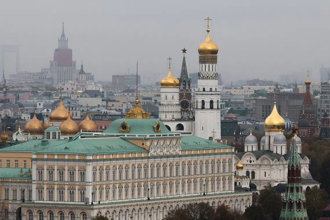 A view of the Kremlin's Spasskaya Tower, the Ivan the Great Bell tower and the Grand Kremlin Palace from the dome of the Christ the Saviour Cathedral in Moscow, Russia October 20, 2025. REUTERS/Shamil Zhumatov