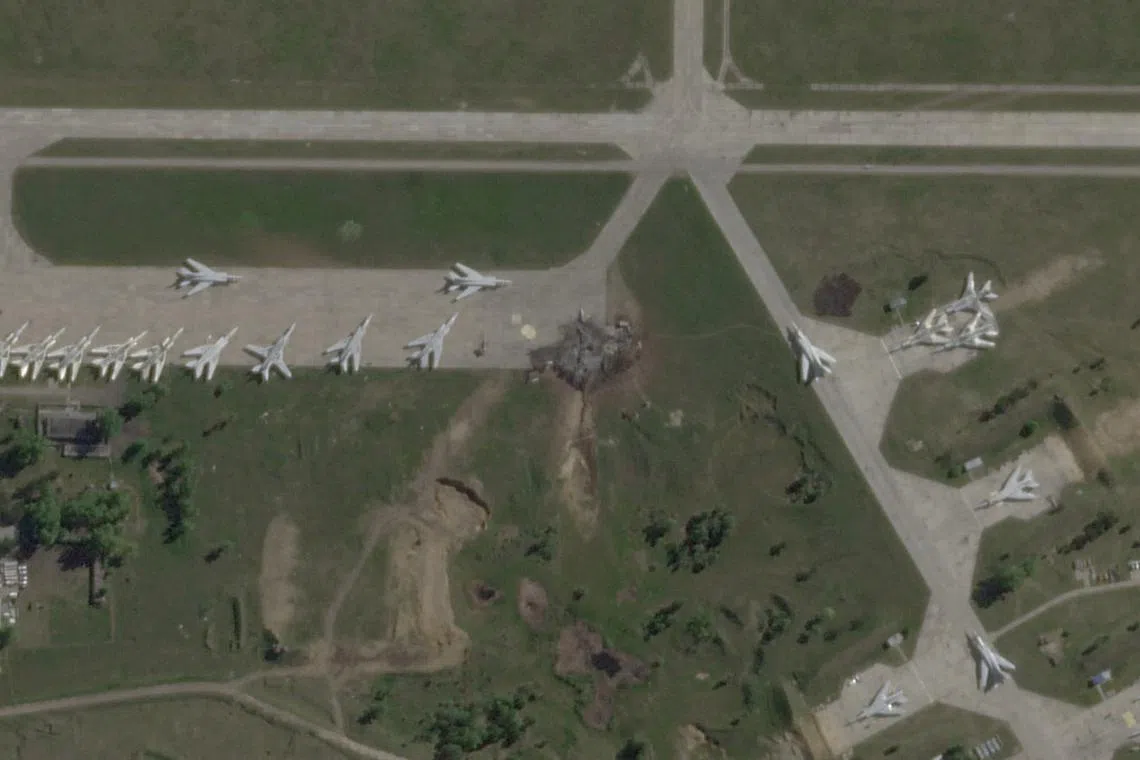 FILE PHOTO: A satellite view shows military aircraft, some sitting destroyed, at the Belaya air base, near Stepnoy, Irkutsk region, Russia, June 4, 2025, after Ukraine launched a drone attack, dubbed \"Operation Spider's Web\", targeting Russian strategic bombers during Russia's ongoing invasion of Ukraine. 2025 Planet Labs PBC/Handout via REUTERS    THIS IMAGE HAS BEEN SUPPLIED BY A THIRD PARTY. MANDATORY CREDIT/File Photo