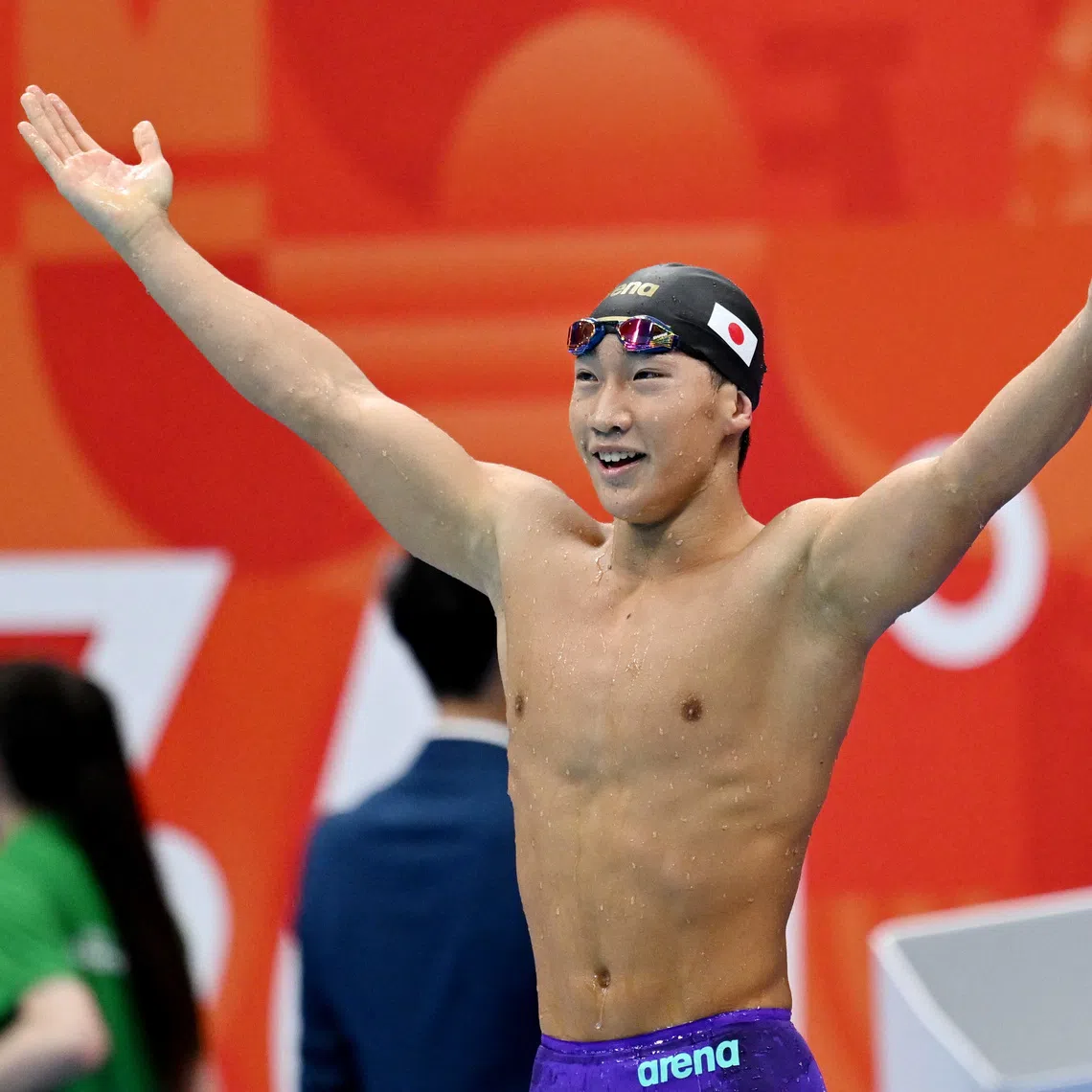 Asian Games - Aichi-Nagoya 2026 - Swimming - Tokyo Aquatics Centre, Koto, Tokyo, Japan - September 24, 2026 Japan's Shin Ohashi celebrates winning gold in the Men's 200m Breaststroke Final REUTERS/Andy Chua