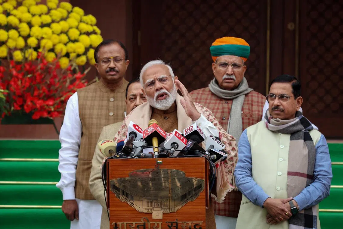 India's Prime Minister Narendra Modi speaks with the media inside the parliament premises upon his arrival on the first day of the budget session in New Delhi, India, January 31, 2024. REUTERS/Altaf Hussain/ File Photo
